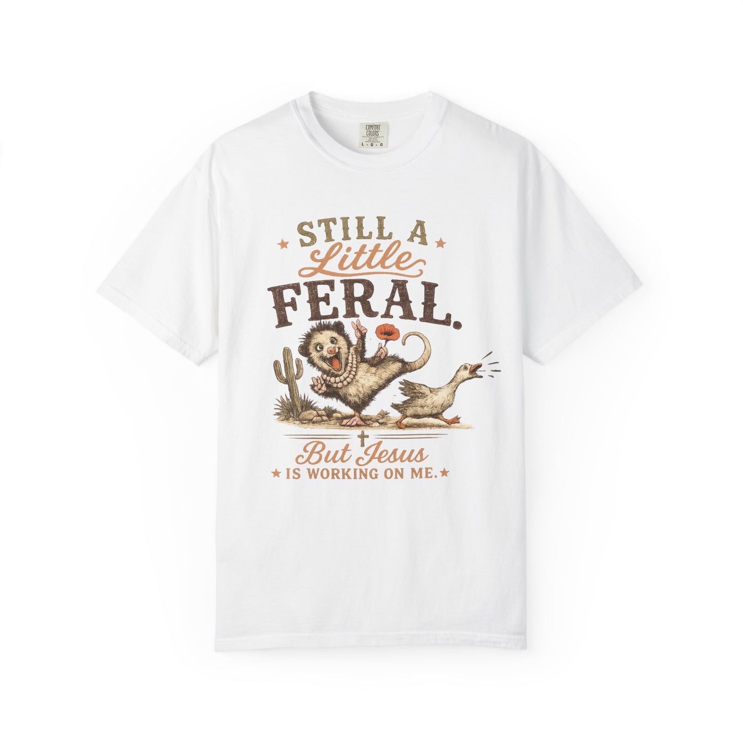Still a Little Feral, But Jesus Is Working on Me™ Graphic Tee Garment-Dyed T-shirt