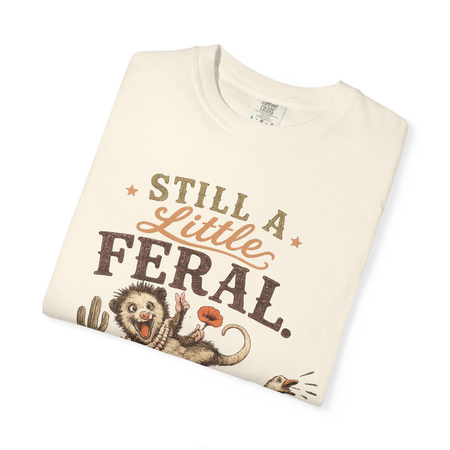 Still a Little Feral, But Jesus Is Working on Me™ Graphic Tee Garment-Dyed T-shirt