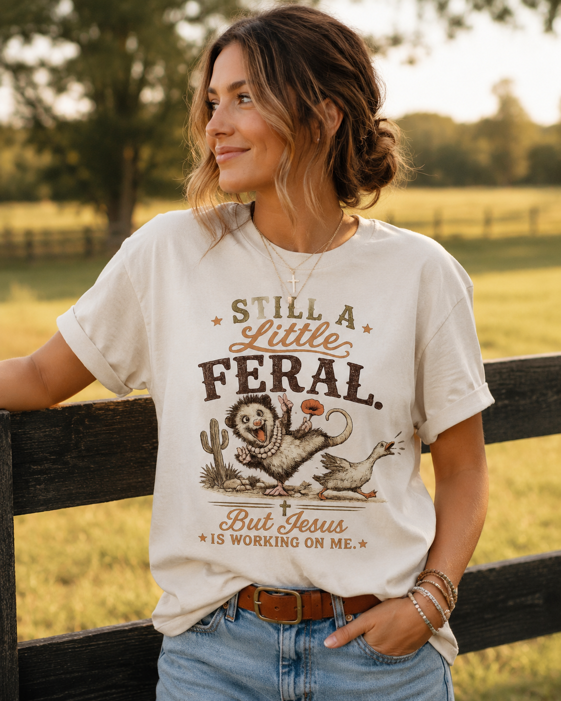 Still a Little Feral, But Jesus Is Working on Me™ Graphic Tee Garment-Dyed T-shirt