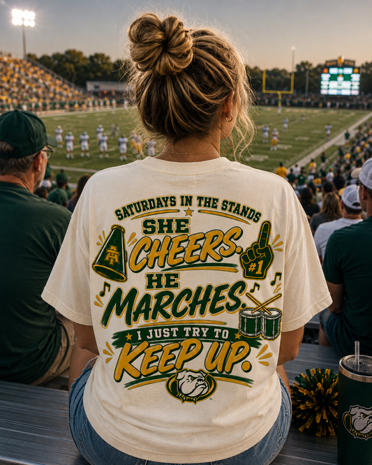 Friday Night Lights Cheer T-Shirt — “She Cheers, She Marches, I Just Try to Keep Up” — Marching Band & Cheer Mom Tee