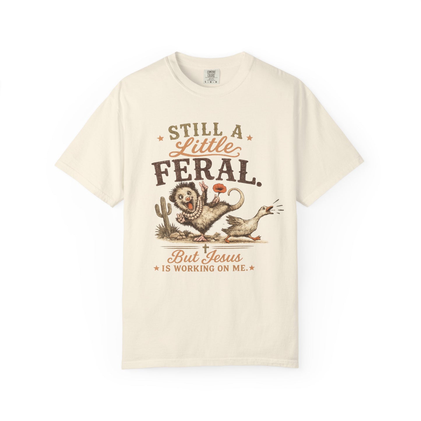 Still a Little Feral, But Jesus Is Working on Me™ Graphic Tee Garment-Dyed T-shirt